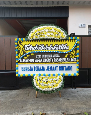 Papan Bunga Duka di Towe